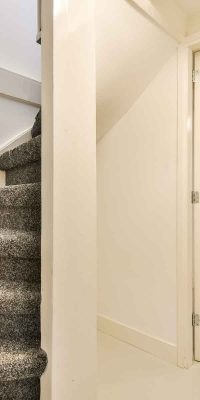 staircase-with-gray-carpet-and-corridor-2021-12-09-14-03-16-utc